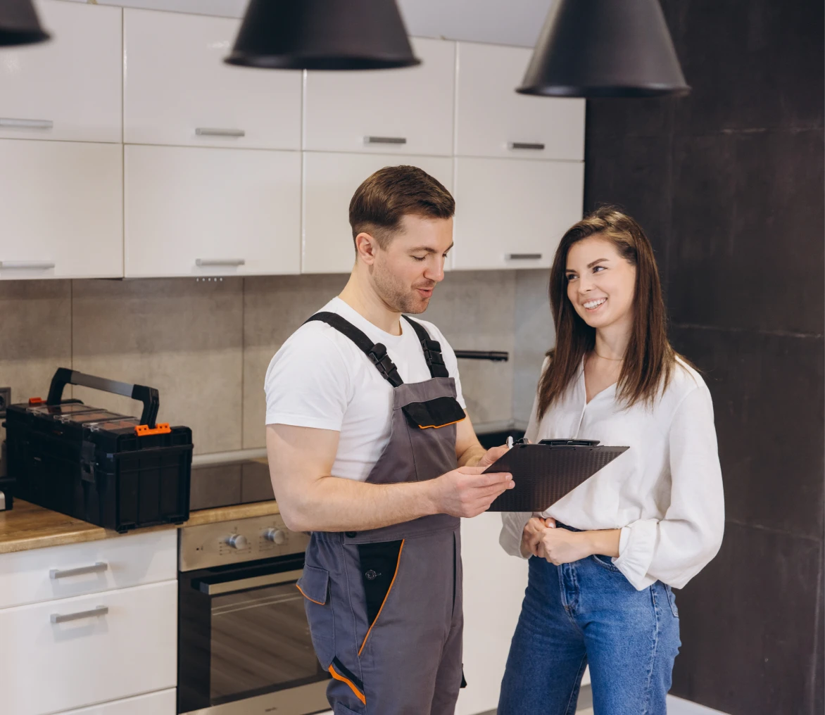 Man and woman discussing kitchen renovations